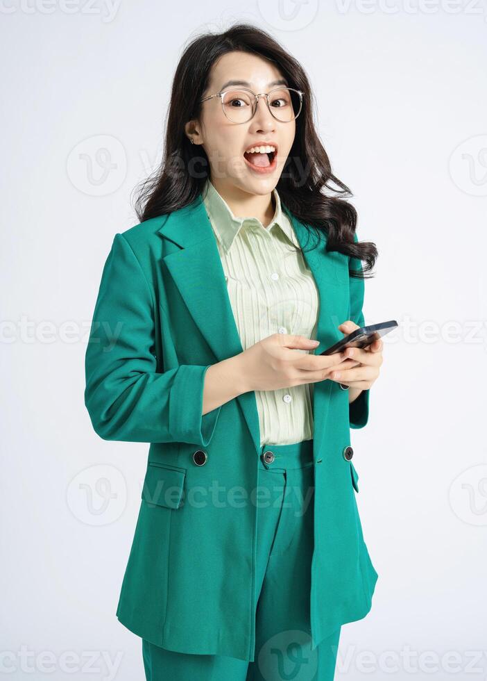 Image of young Asian business woman on background photo