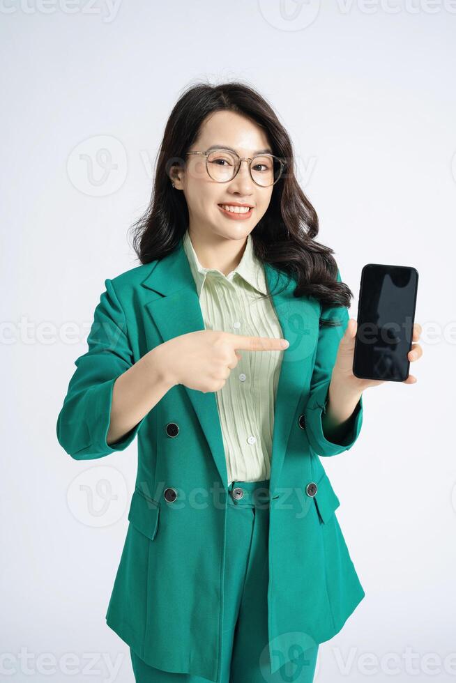 Image of young Asian business woman on background photo