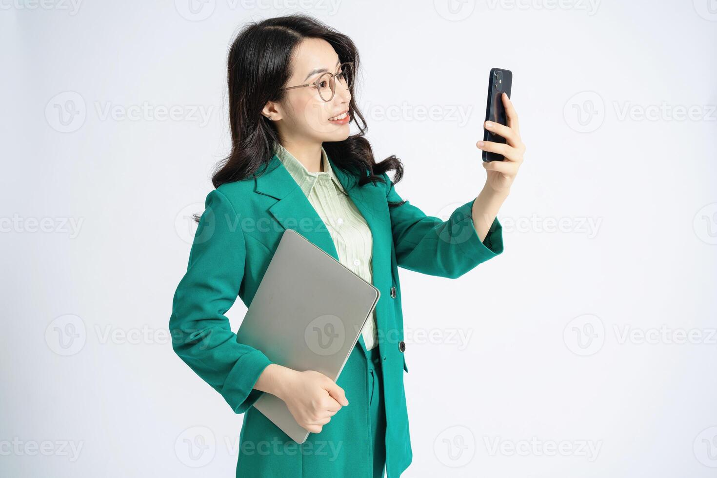 Image of young Asian business woman on background photo