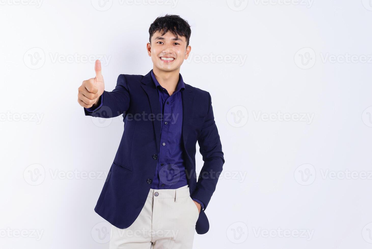 Photo of young Asian businessman on white background