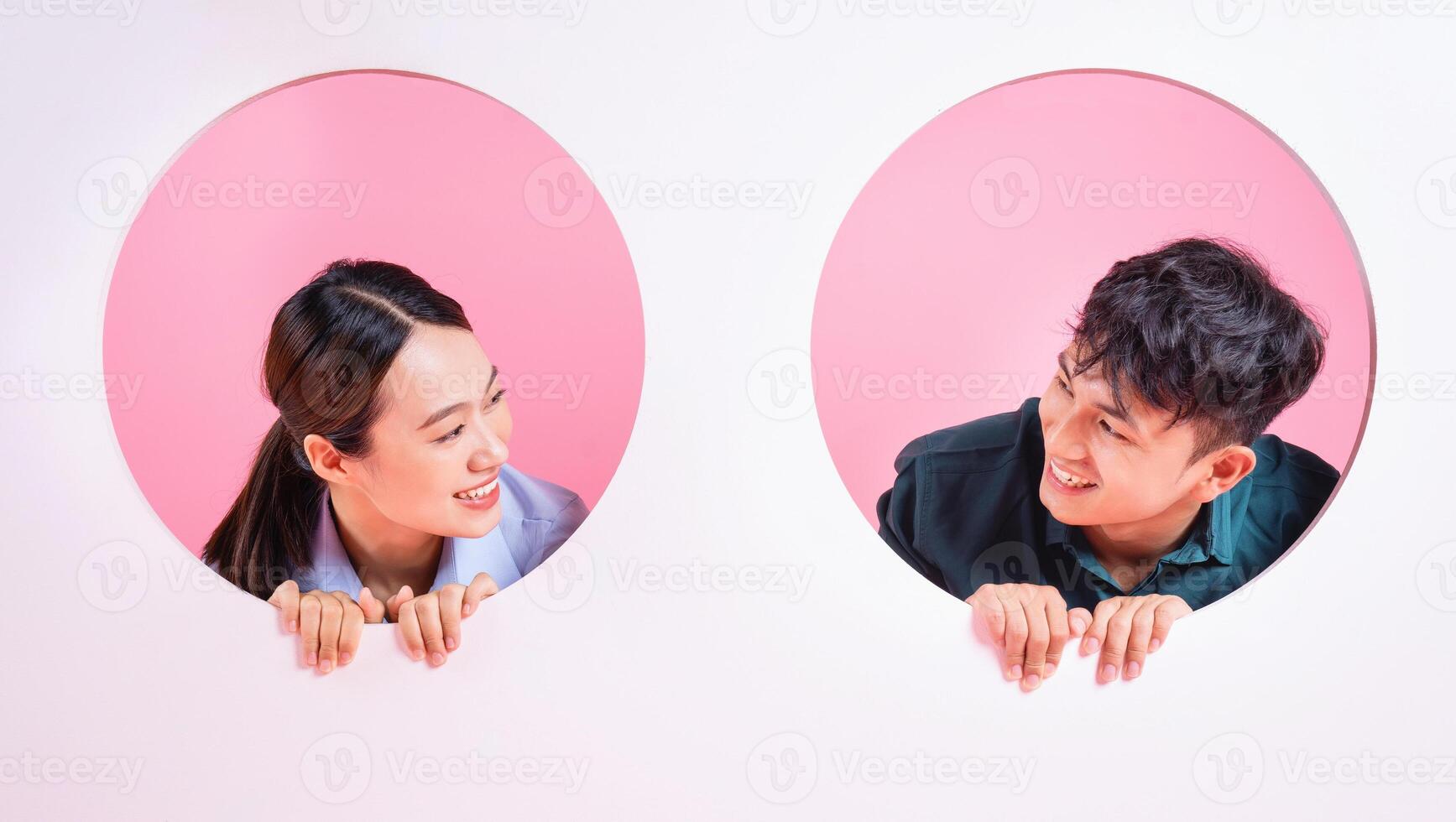 Photo of young Asian couple on background