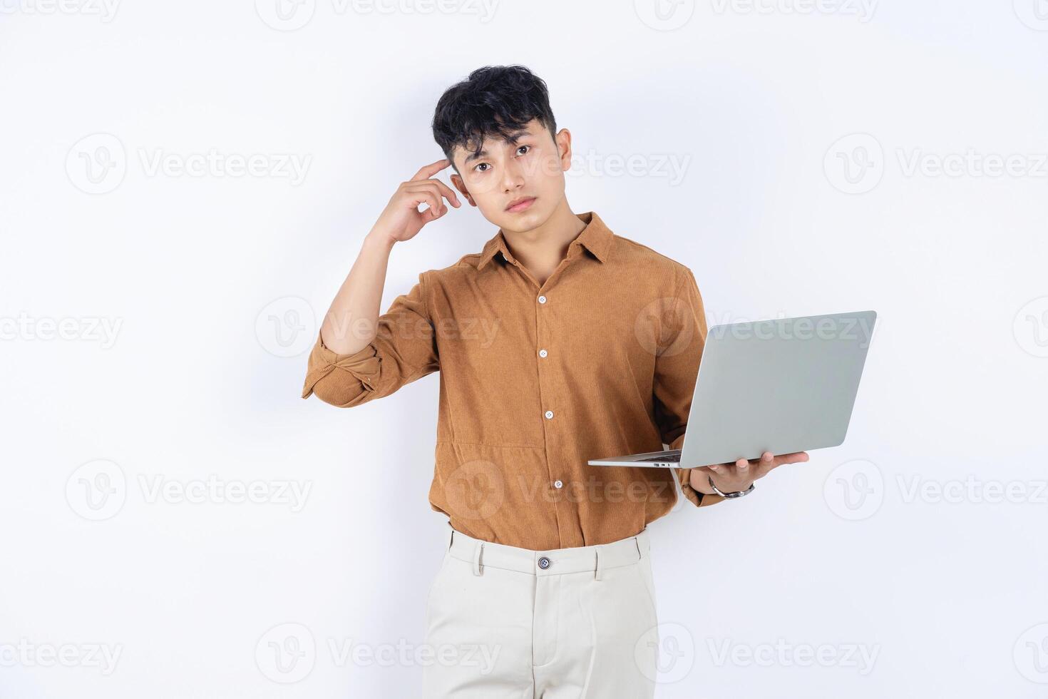 Photo of young Asian businessman on white background