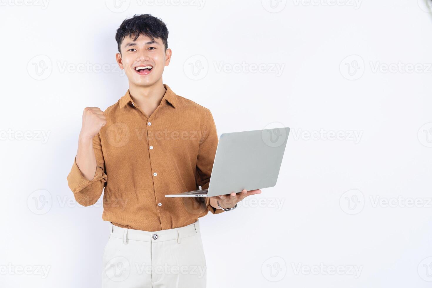 Photo of young Asian businessman on white background