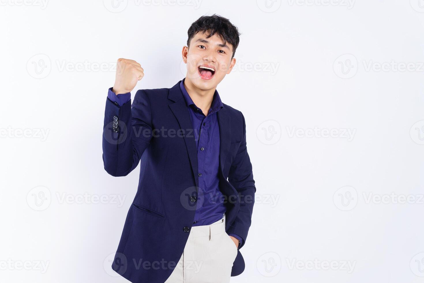 Photo of young Asian businessman on white background