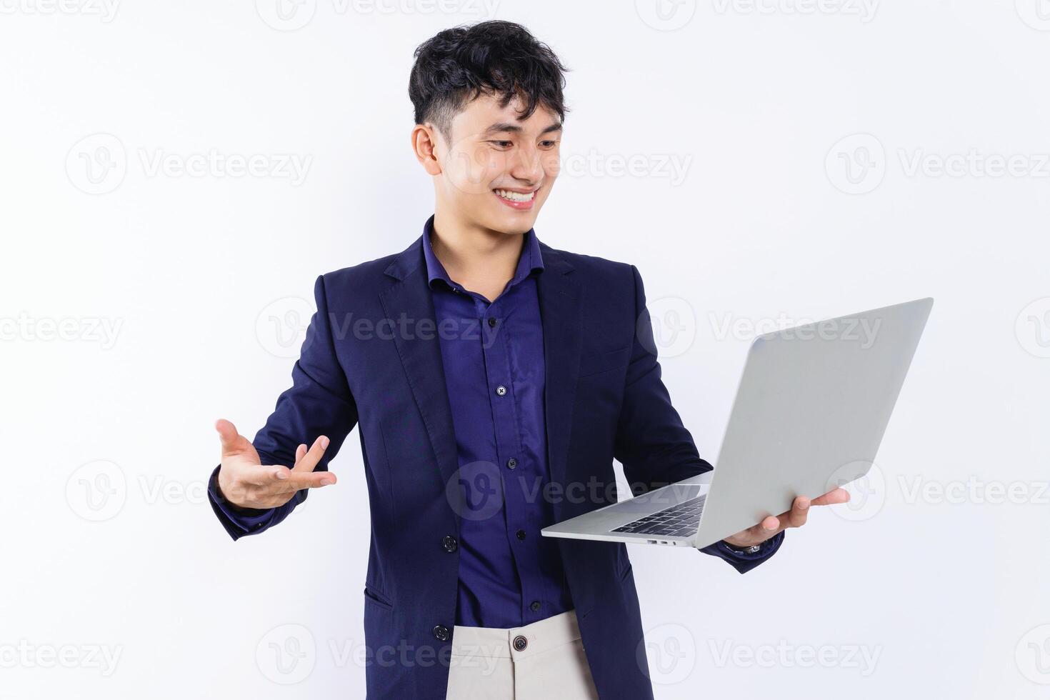 Photo of young Asian businessman on white background