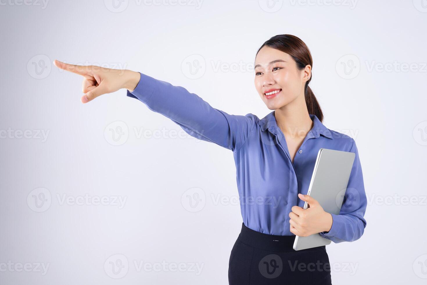 Photo of young Asian businesswoman on white background
