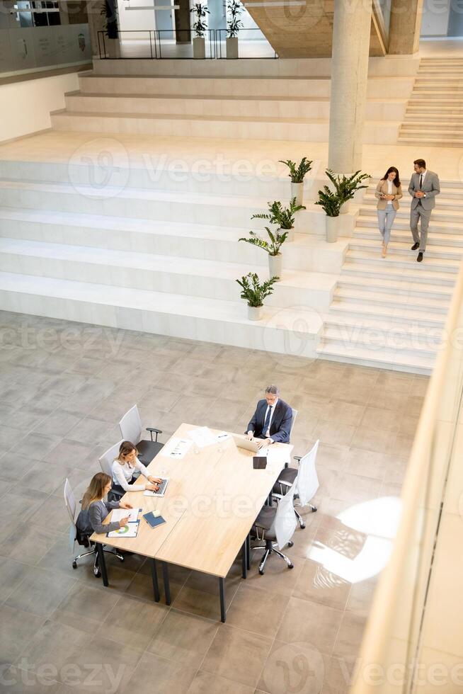 Aerial view at young startup team working in the office photo