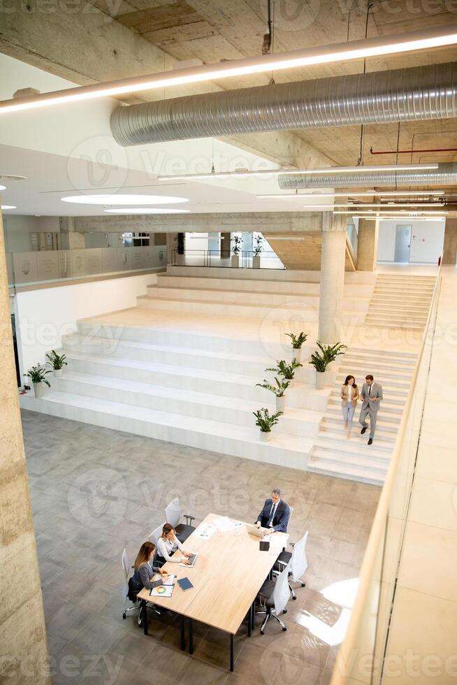 Aerial view at young startup team working in the office photo
