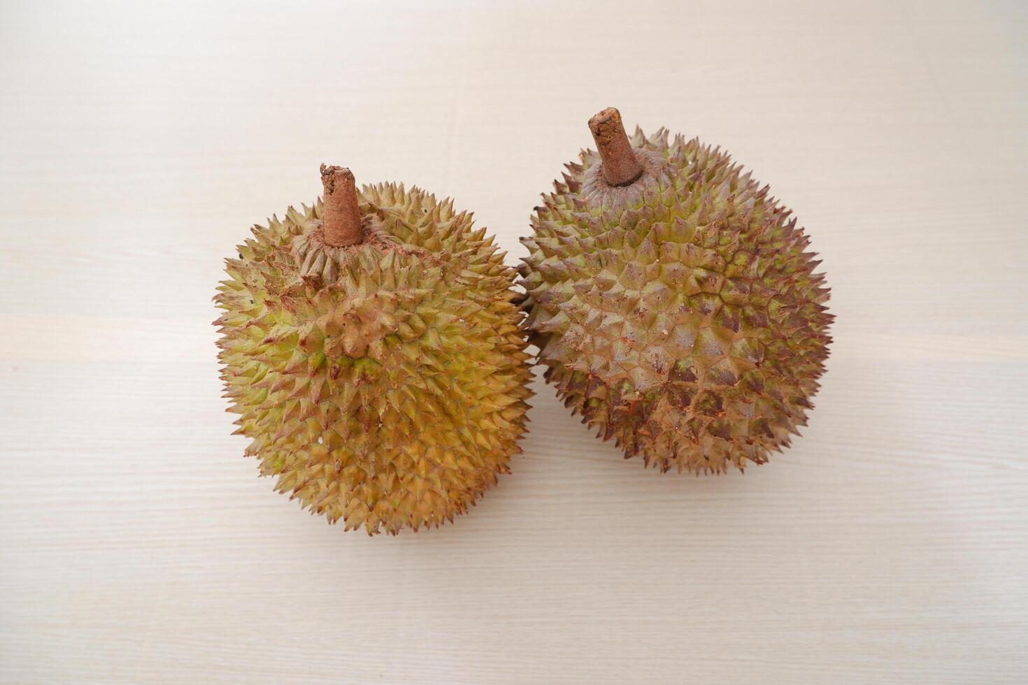 durian fruit on the wood table, closeup of photo