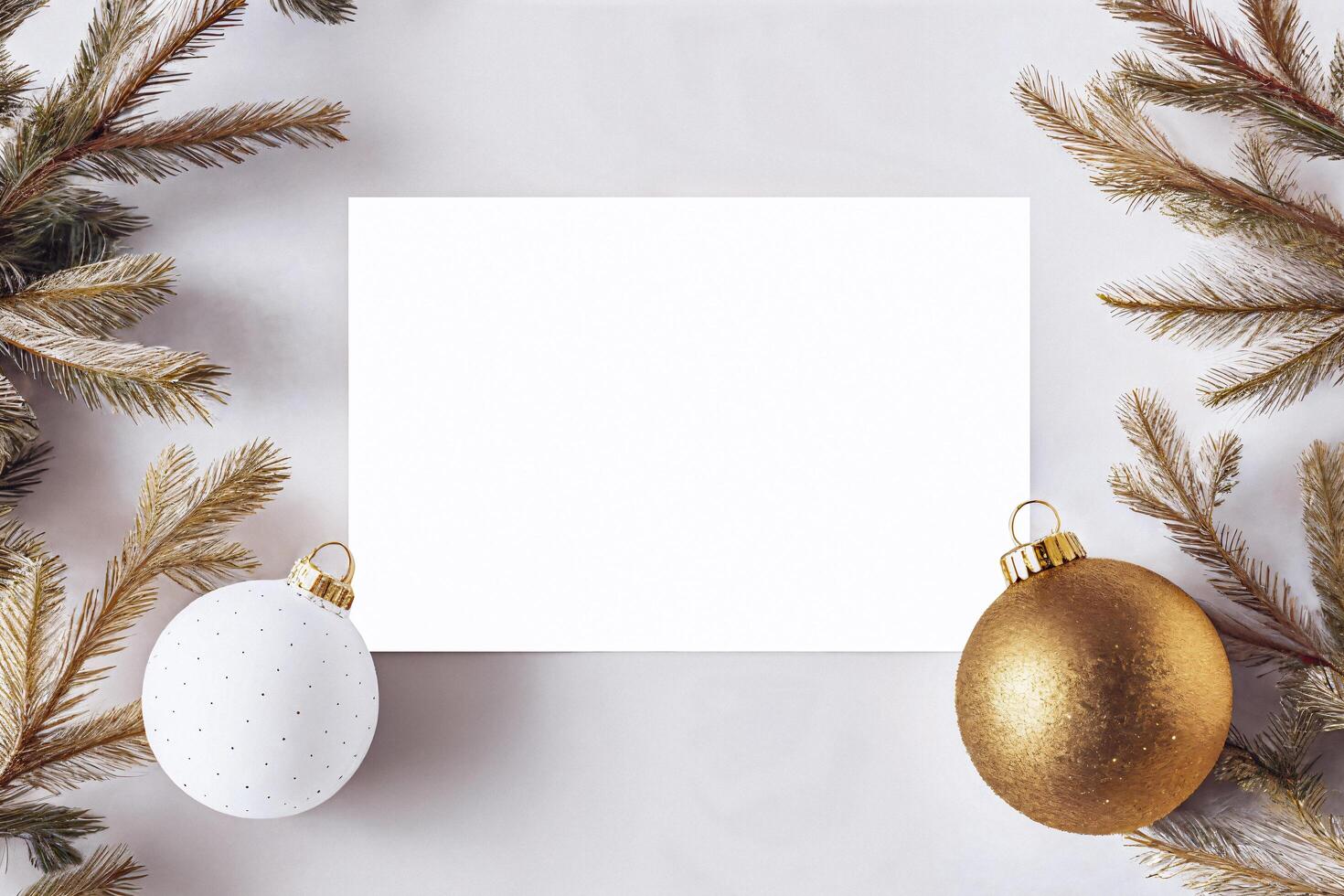 Christmas poster mockup with gold toys and spruce branch photo