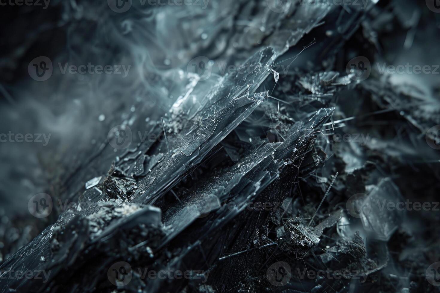 A closeup of naturally occurring fibrous silicate mineral asbestos on dark background photo