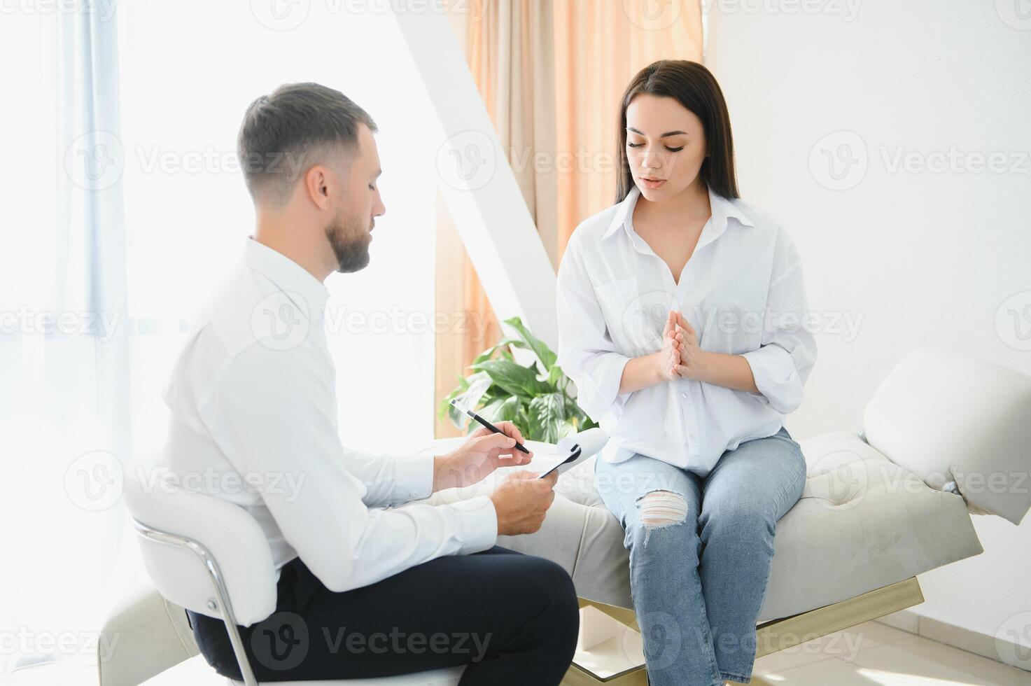 session with psychotherapist, woman with depression solves mental difficulties and talks about problems to male psychologist. mental health. treatment of nervous and mental disorders. anxiety photo