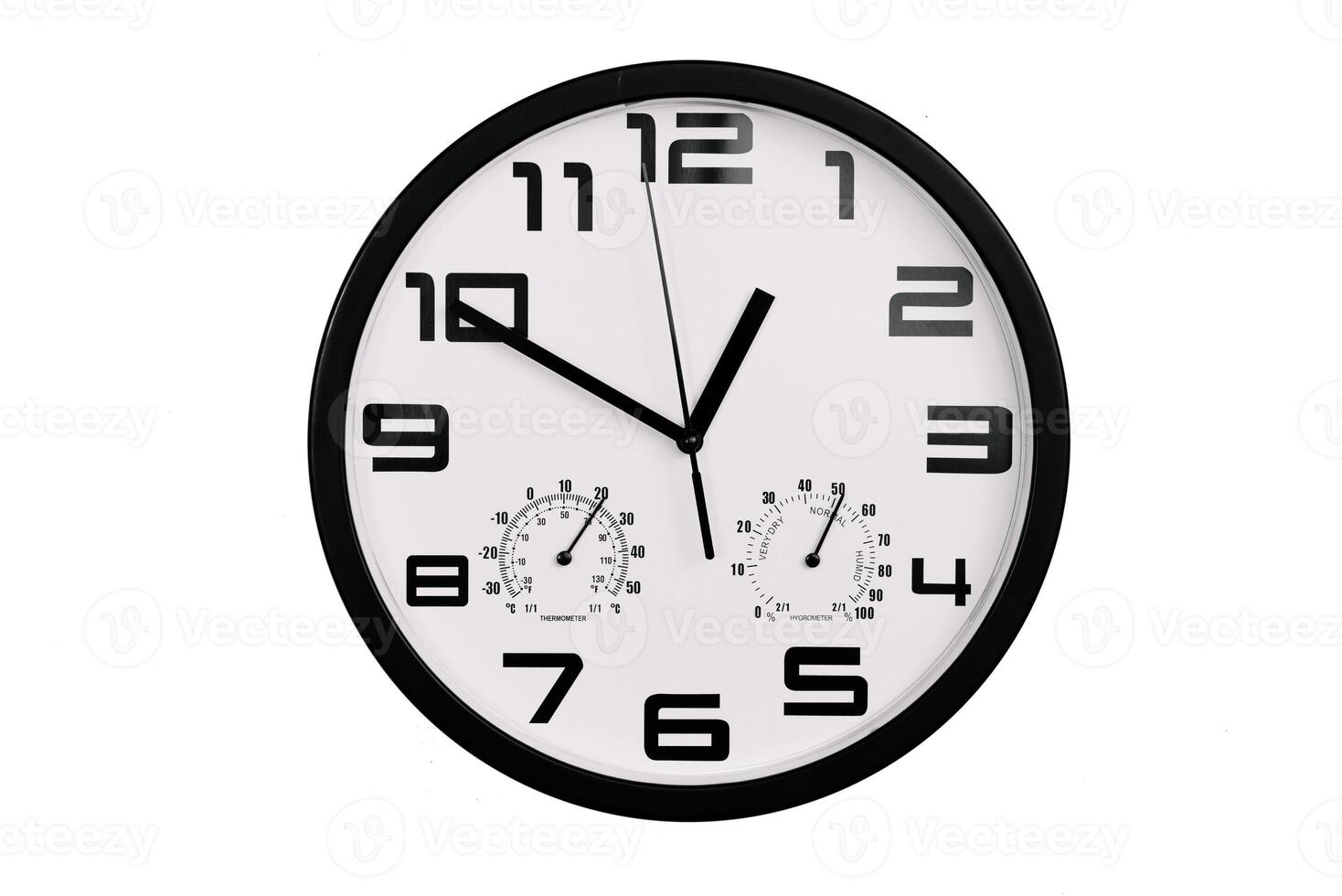 simple classic black and white round wall clock isolated on white. Clock with arabic numerals on wall shows photo