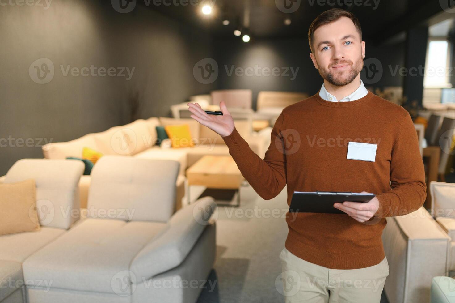Sales assistant in furniture store photo