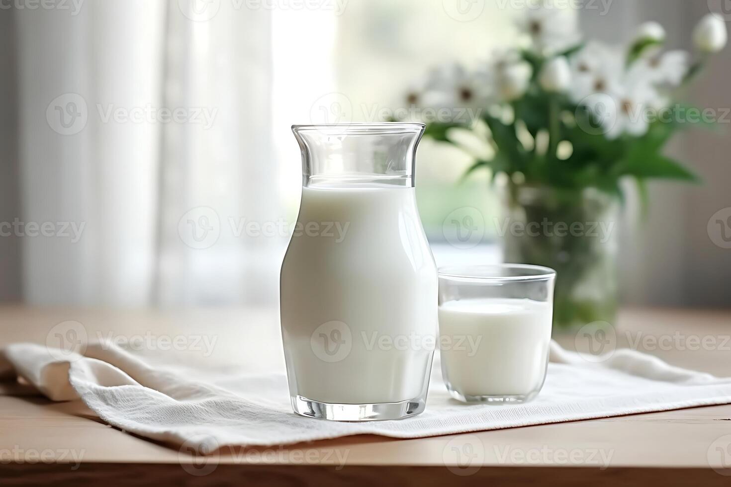 Jug of milk on wooden table in kitchen, close-up photo