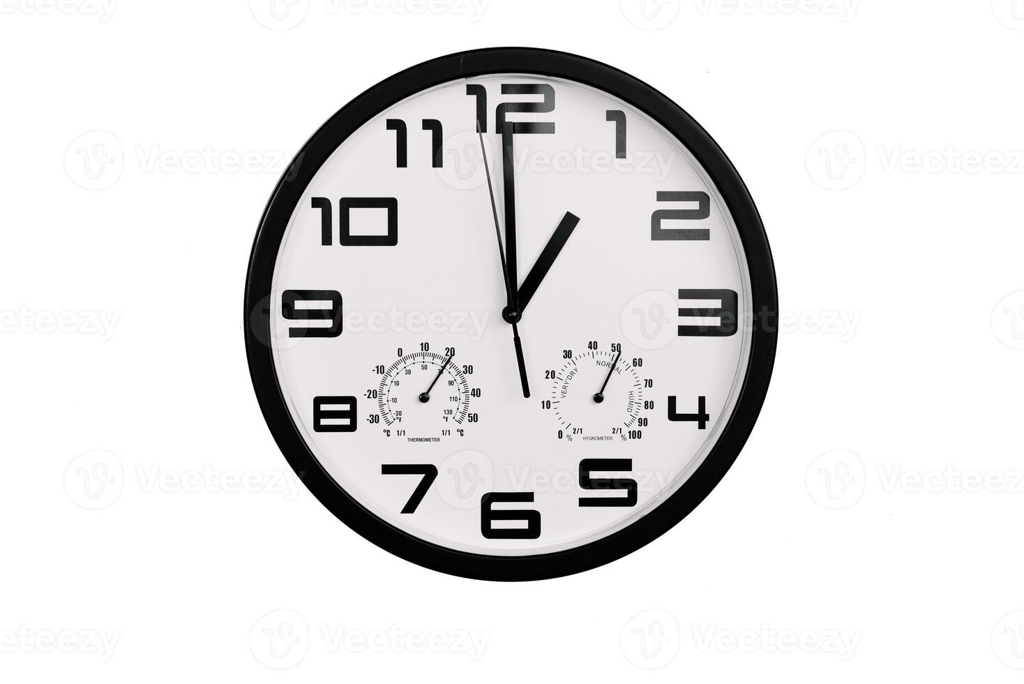 simple classic black and white round wall clock isolated on white. Clock with arabic numerals on wall shows photo