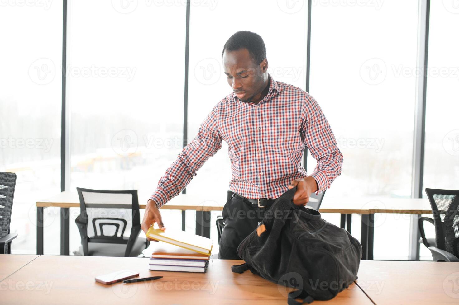 Portrait of african university student in class looking at camera photo