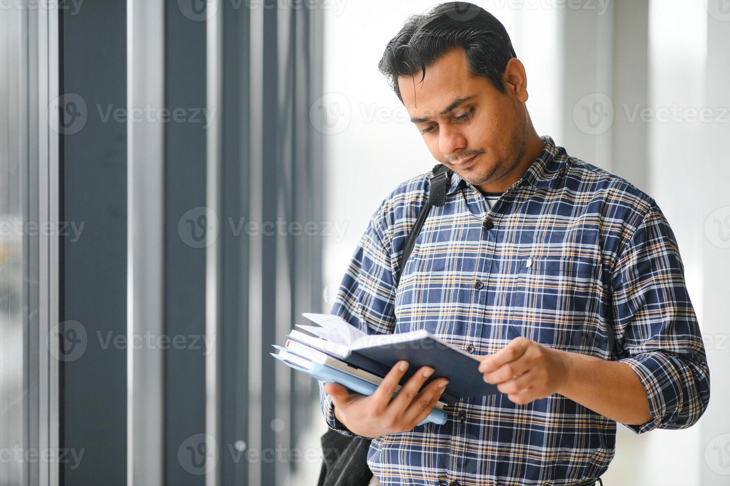 Portrait of a young Indian male student photo