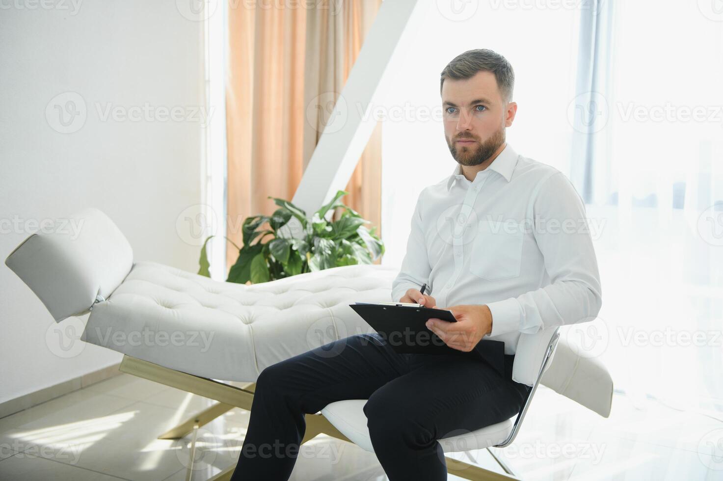 Man psychologist specialist professional doctor in the office photo