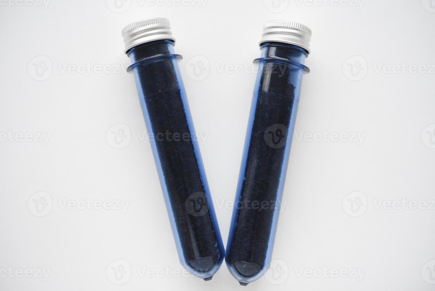 Two blue plastic flasks with a shiny lid. Flasks with tea inside. photo