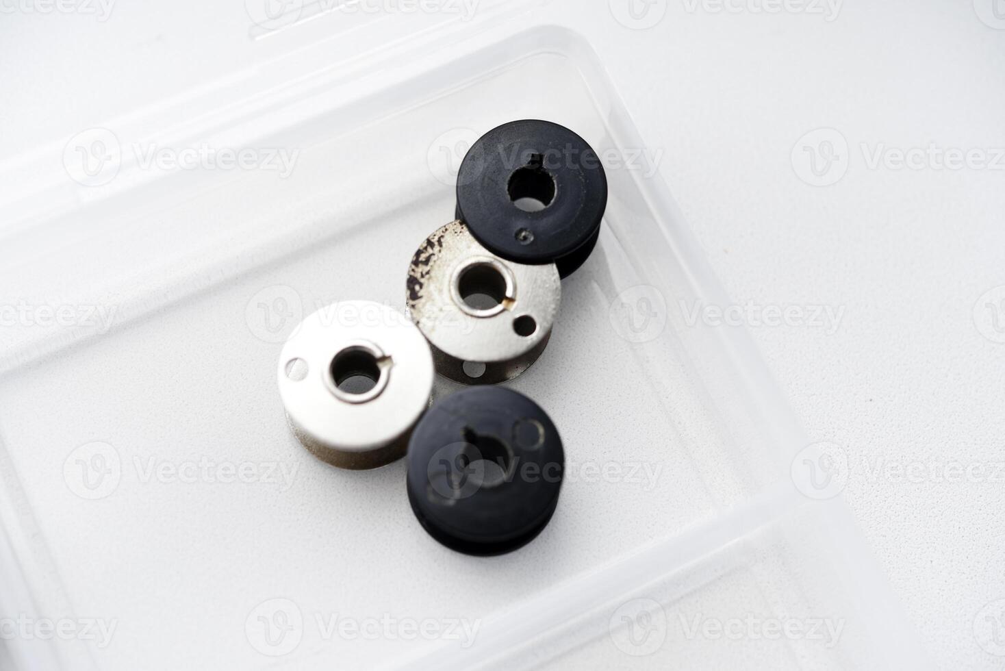 Spools for sewing machines. A spool of thread. photo