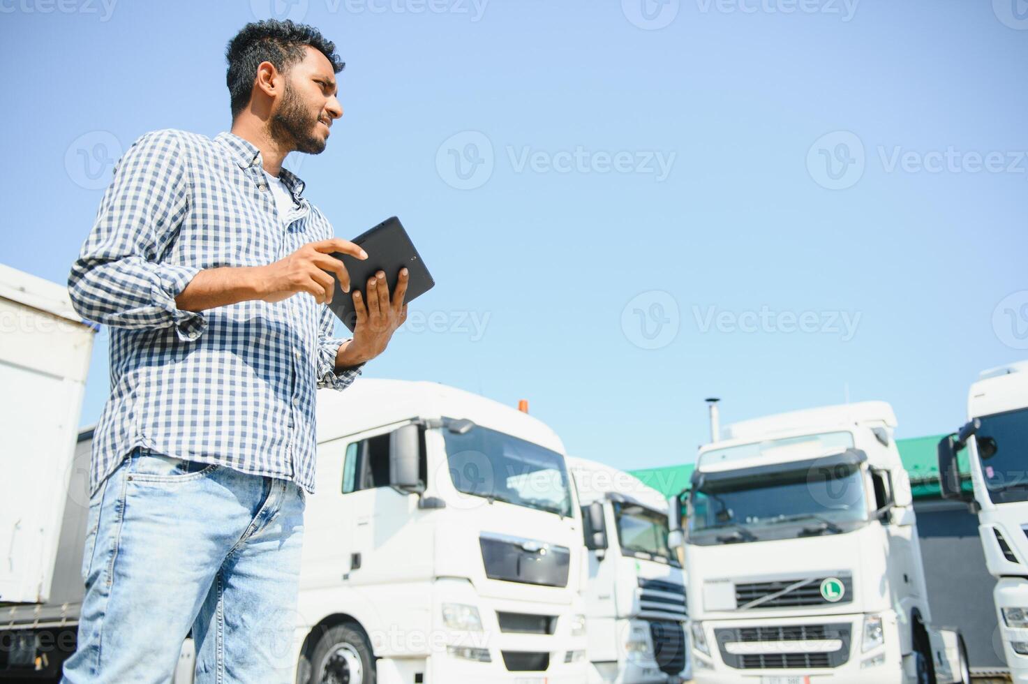 Portrait of a indian truck driver. photo