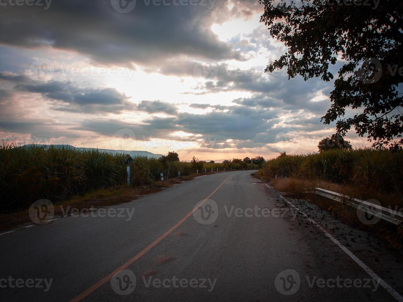 Spectacular sunset over, orange sun rising up over the horizon photo