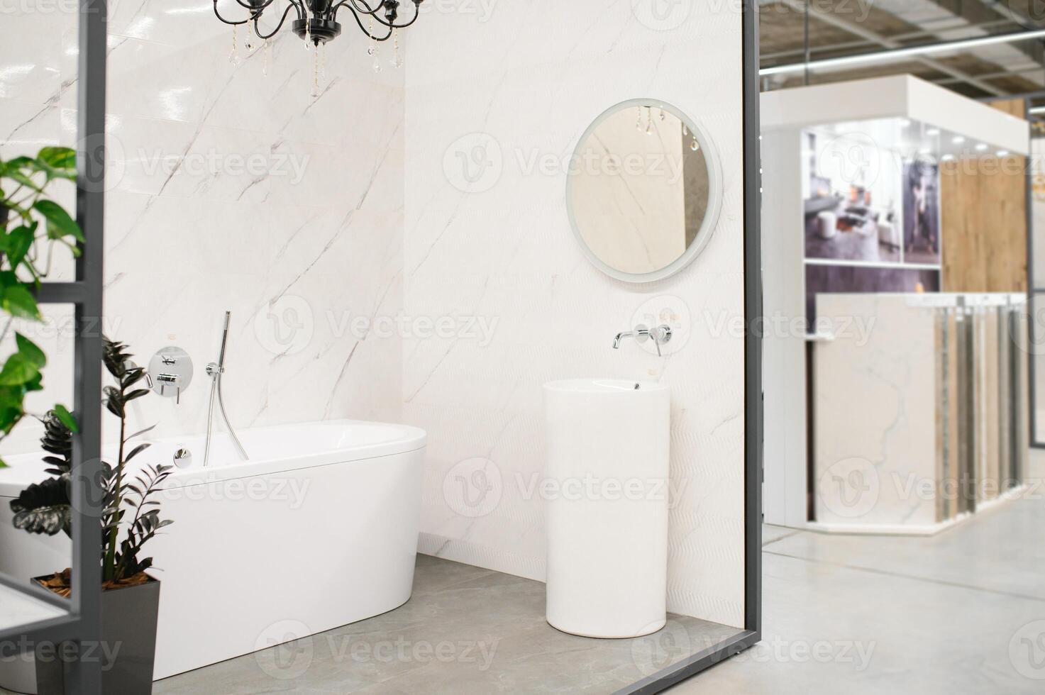 Interior photography of plumbing establishment where tiles, bathtubs, furniture and toilets are sold photo