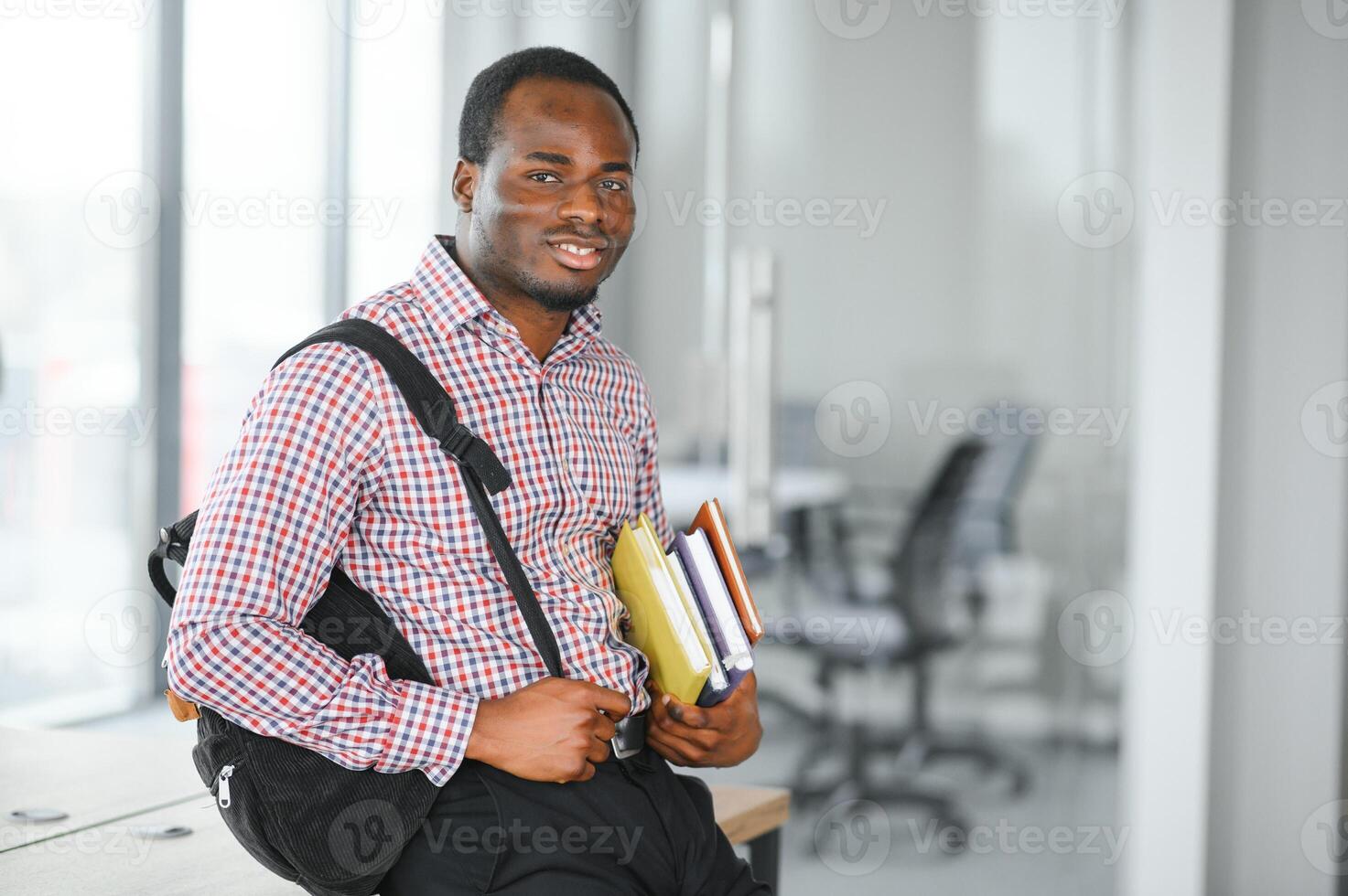 Portrait of african university student in class looking at camera photo