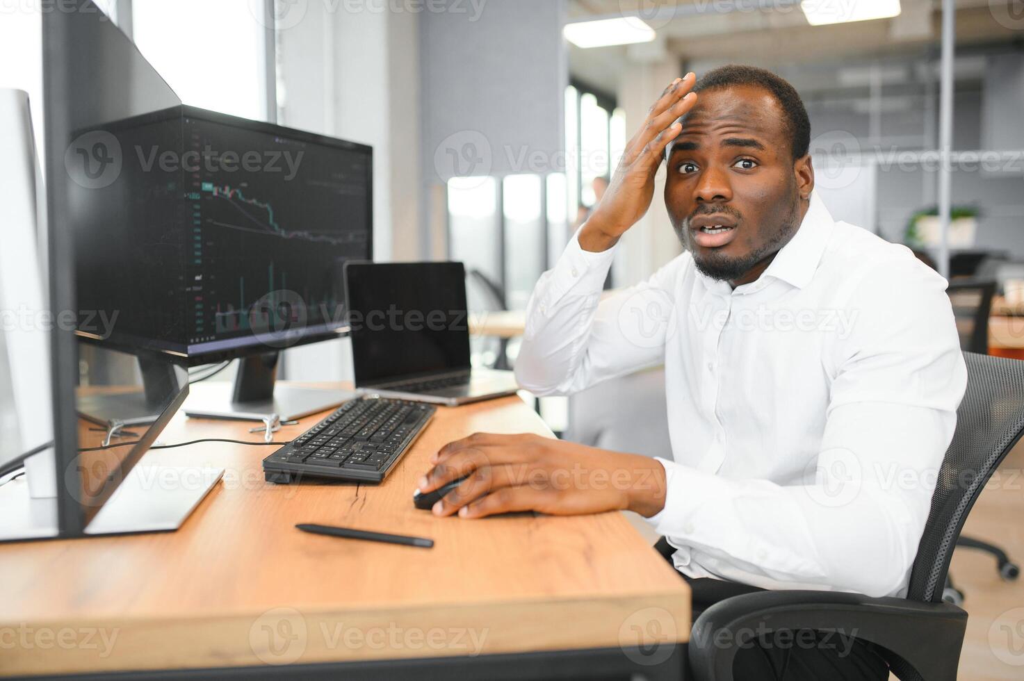 Sad African trader has failed in business. photo