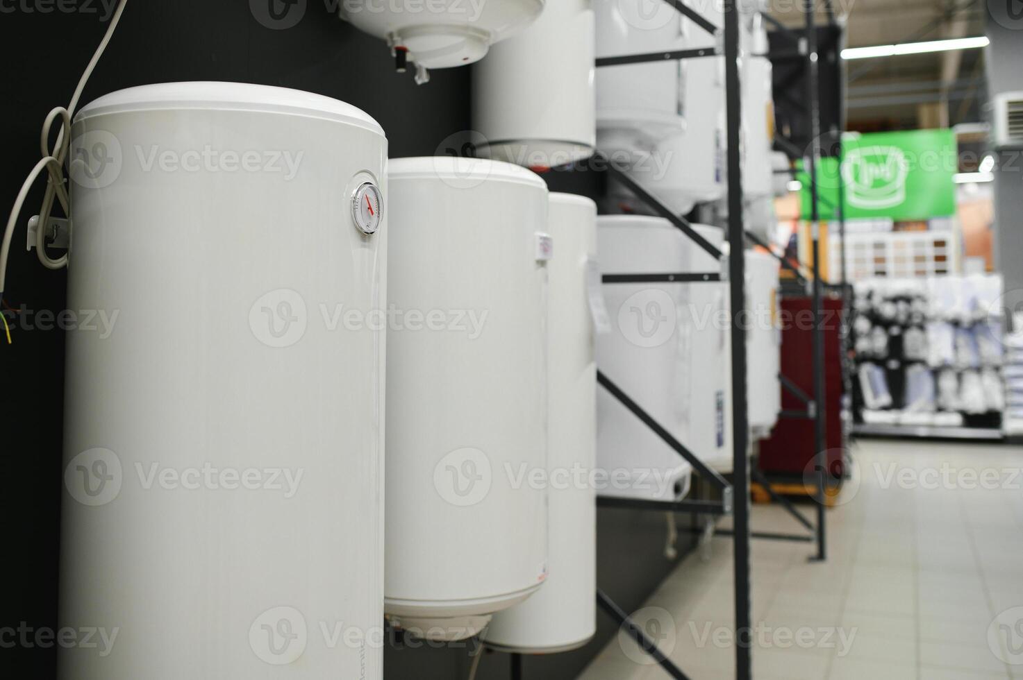 Variety of modern electric boilers presented in store photo