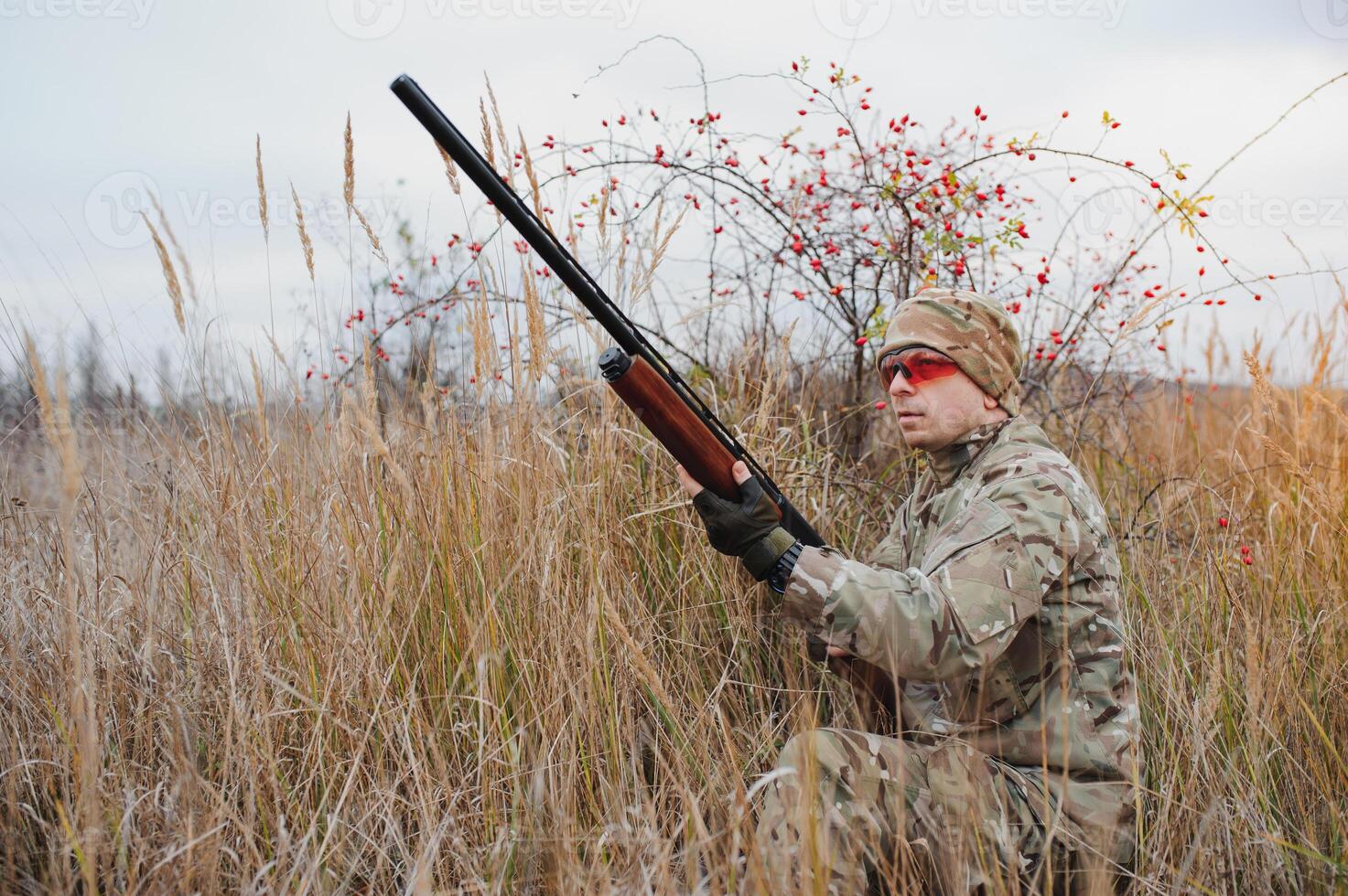 Hunting permit. Man brutal gamekeeper nature background. hunter spend leisure hunting. Hunter hold riffles. Focus and concentration of experienced hunter. Hunting and trapping seasons photo