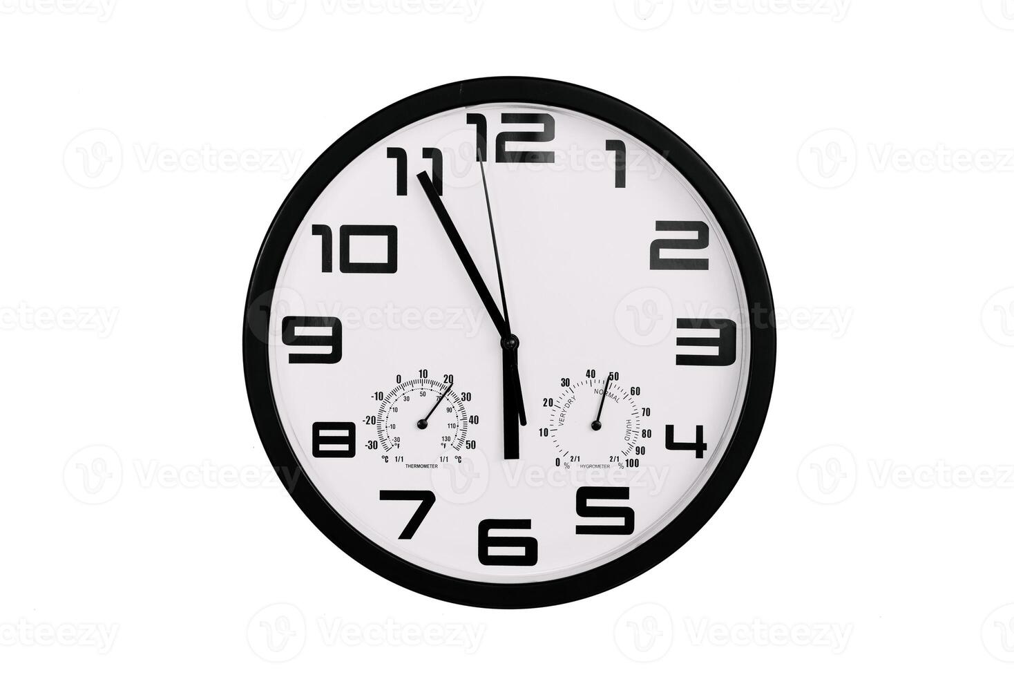 simple classic black and white round wall clock isolated on white. Clock with arabic numerals on wall shows photo