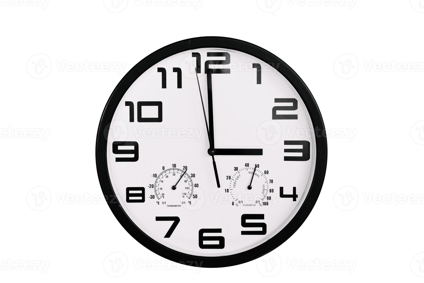 simple classic black and white round wall clock isolated on white. Clock with arabic numerals on wall shows photo