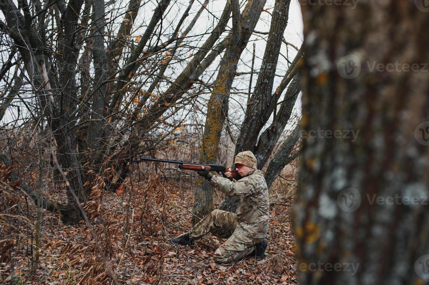 Hunting permit. Man brutal gamekeeper nature background. hunter spend leisure hunting. Hunter hold riffles. Focus and concentration of experienced hunter. Hunting and trapping seasons photo