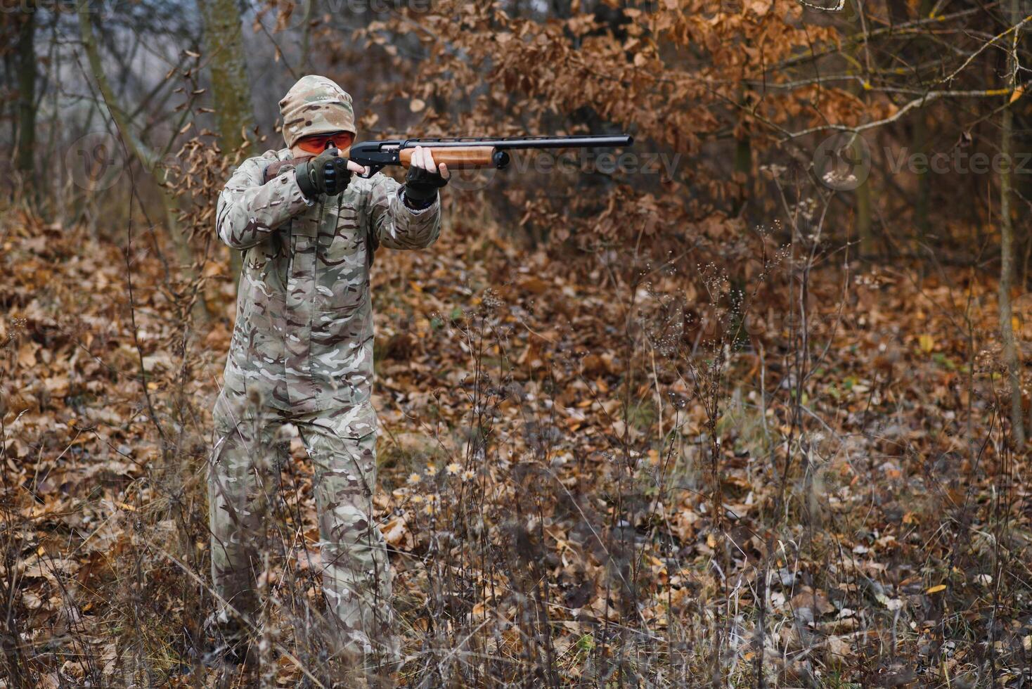 Hunting permit. Man brutal gamekeeper nature background. hunter spend leisure hunting. Hunter hold riffles. Focus and concentration of experienced hunter. Hunting and trapping seasons. photo