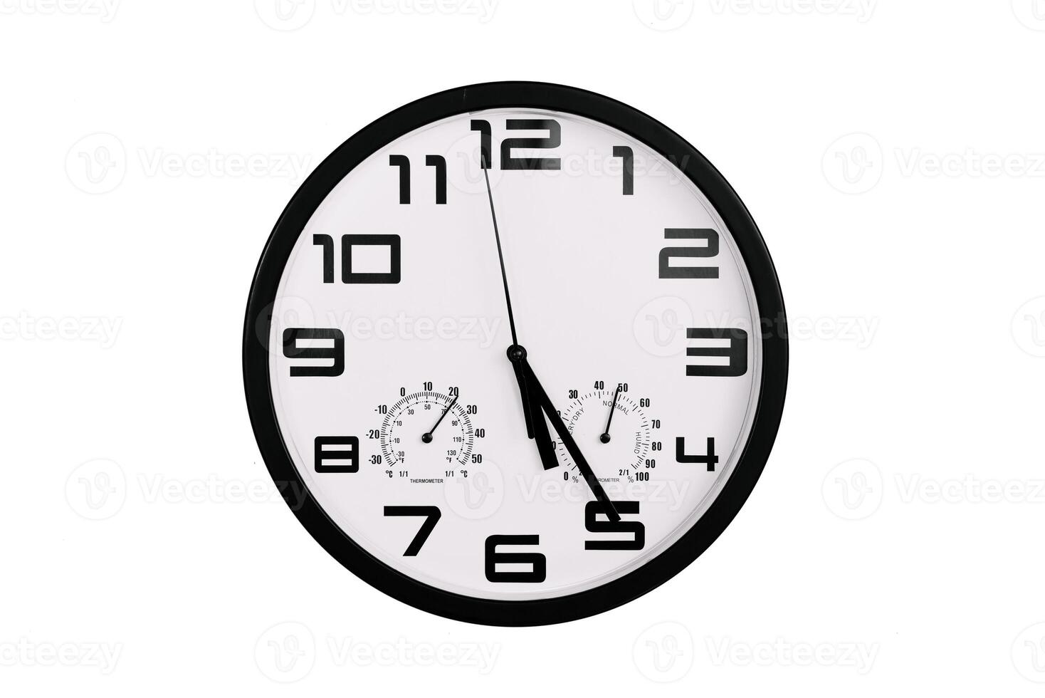 simple classic black and white round wall clock isolated on white. Clock with arabic numerals on wall shows photo