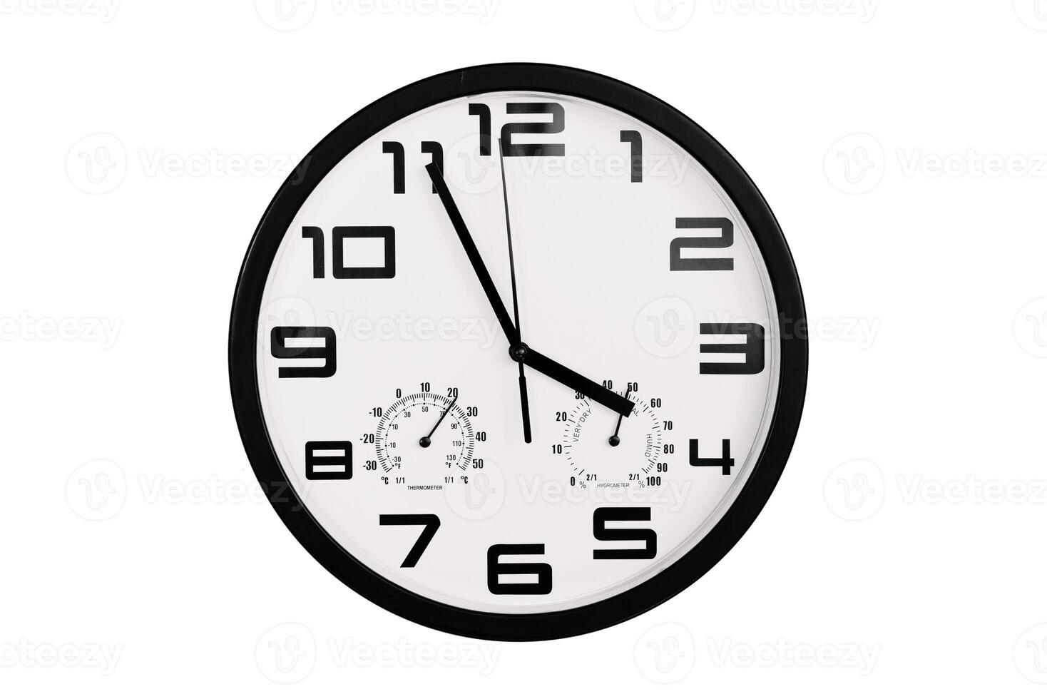 simple classic black and white round wall clock isolated on white. Clock with arabic numerals on wall shows photo