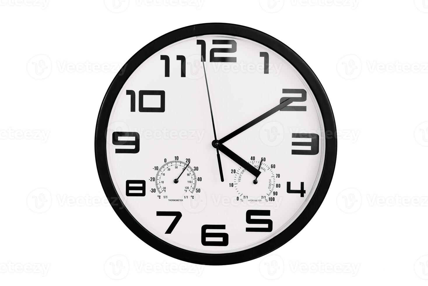 simple classic black and white round wall clock isolated on white. Clock with arabic numerals on wall shows photo