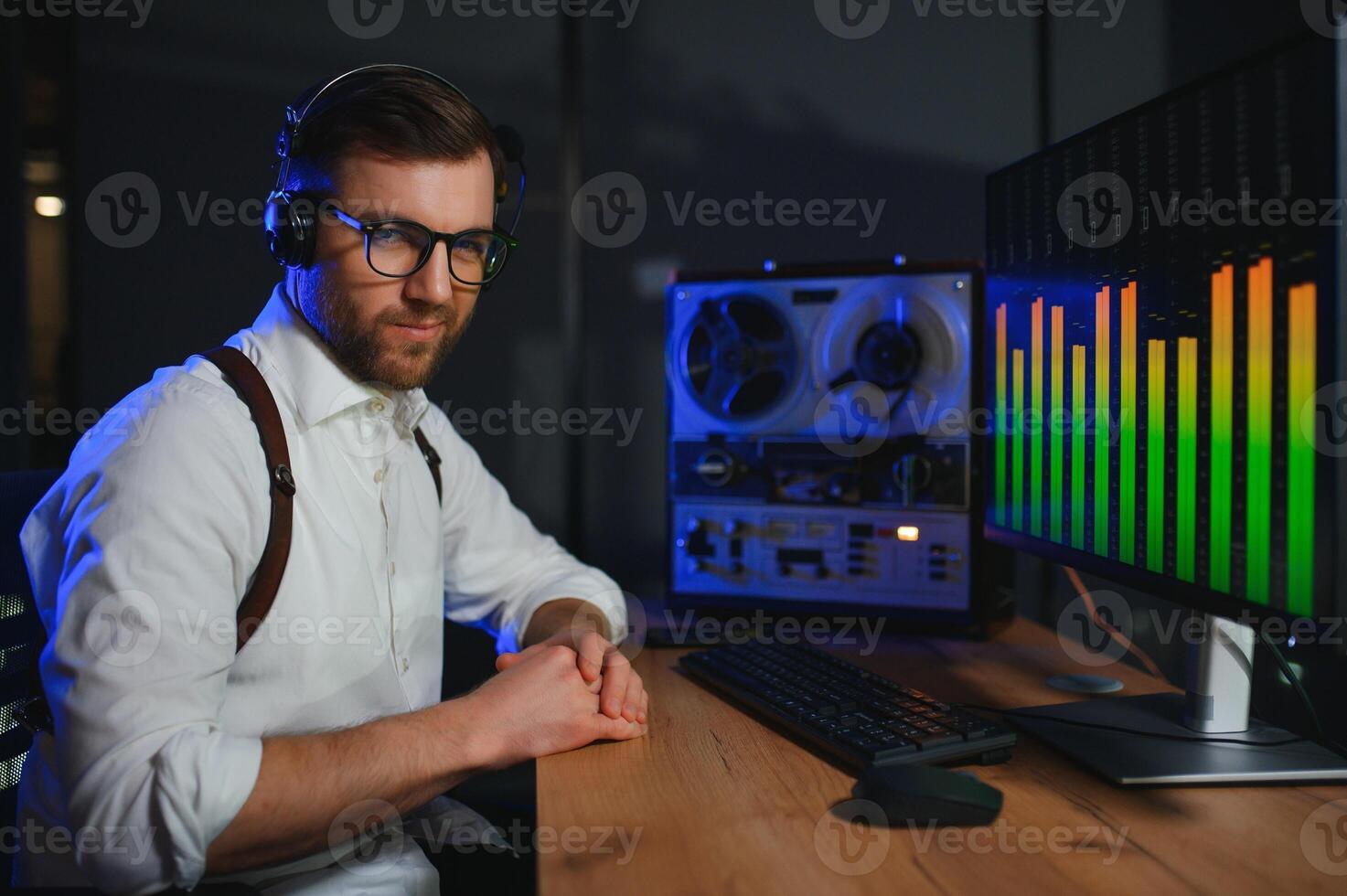 A police officer records a telephone conversation on a tape recorder. secret agent photo