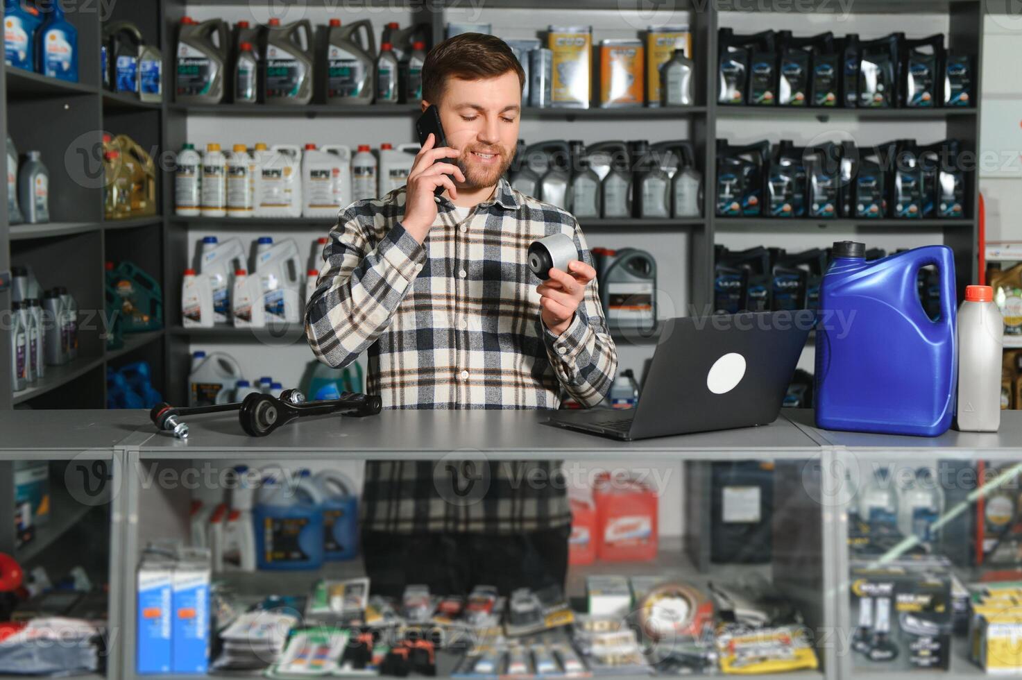 Smiling Salesman Auto Parts Store photo