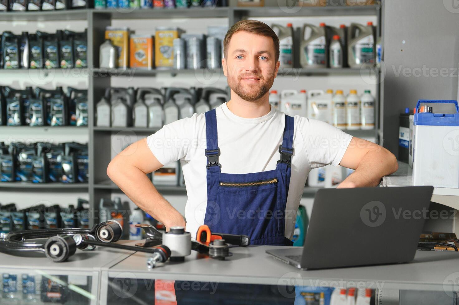 Smiling Salesman Auto Parts Store photo