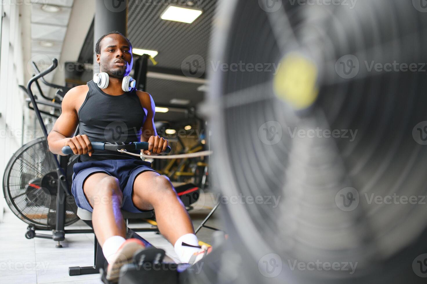 African American man working out in the gym. photo