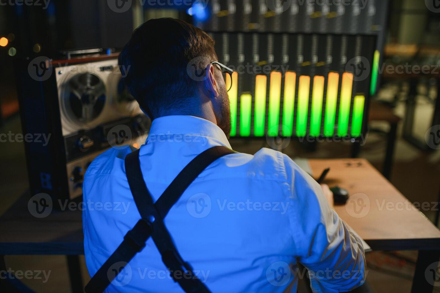 A police officer records a telephone conversation on a tape recorder. secret agent photo