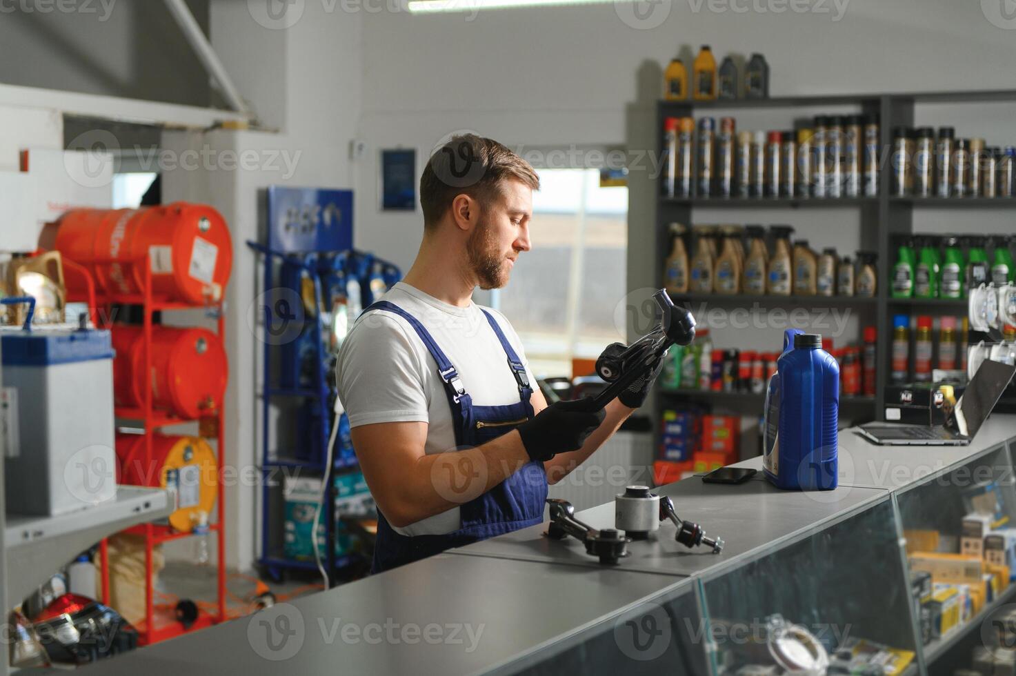 sales consultant in a car parts and accessories store photo