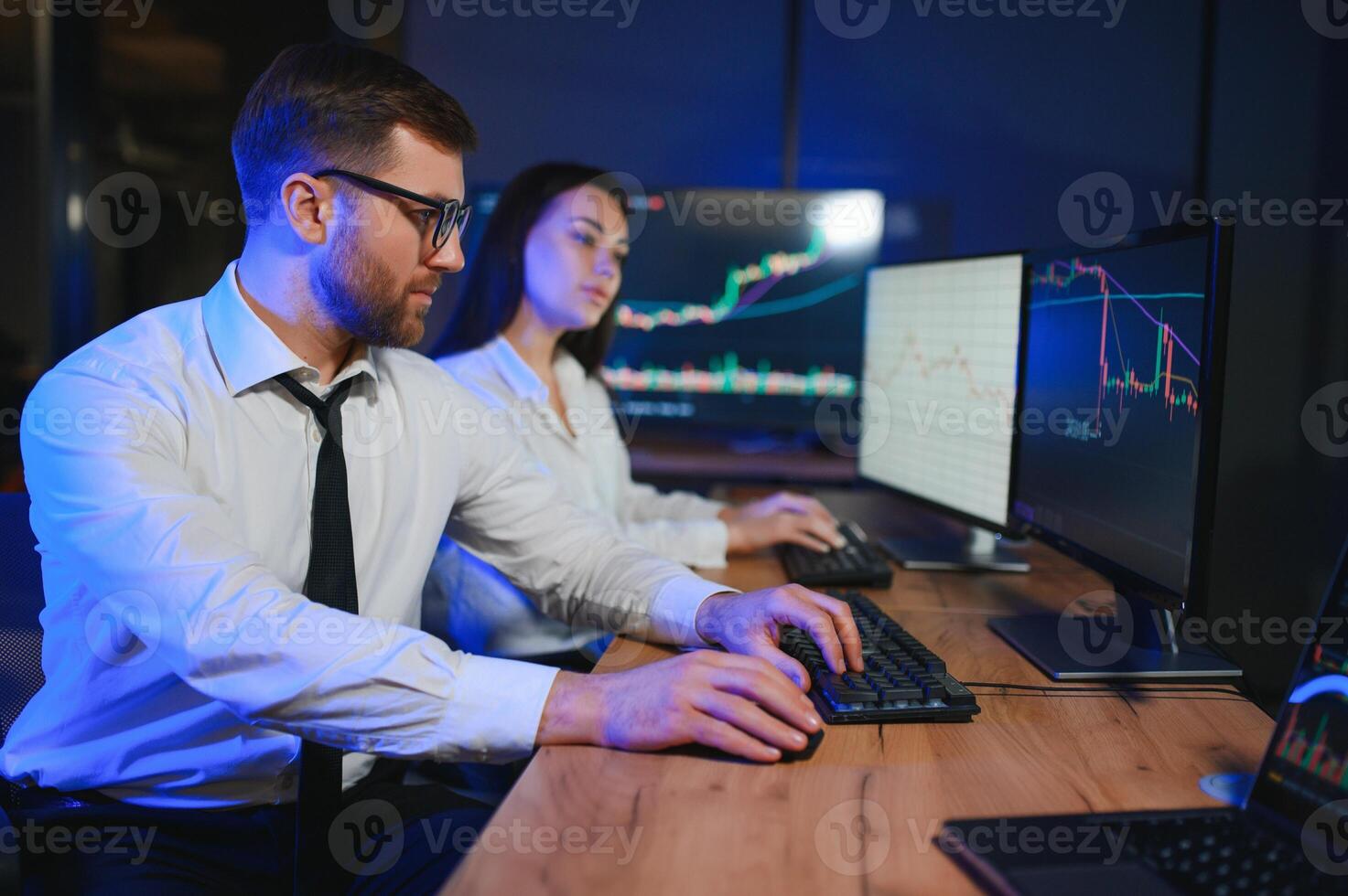 Business team investment working with computer, planning and analyzing graph stock market trading with stock chart data photo