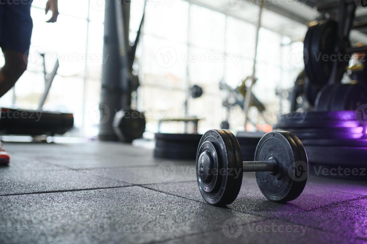 Dumbbell on the floor in the Gym photo