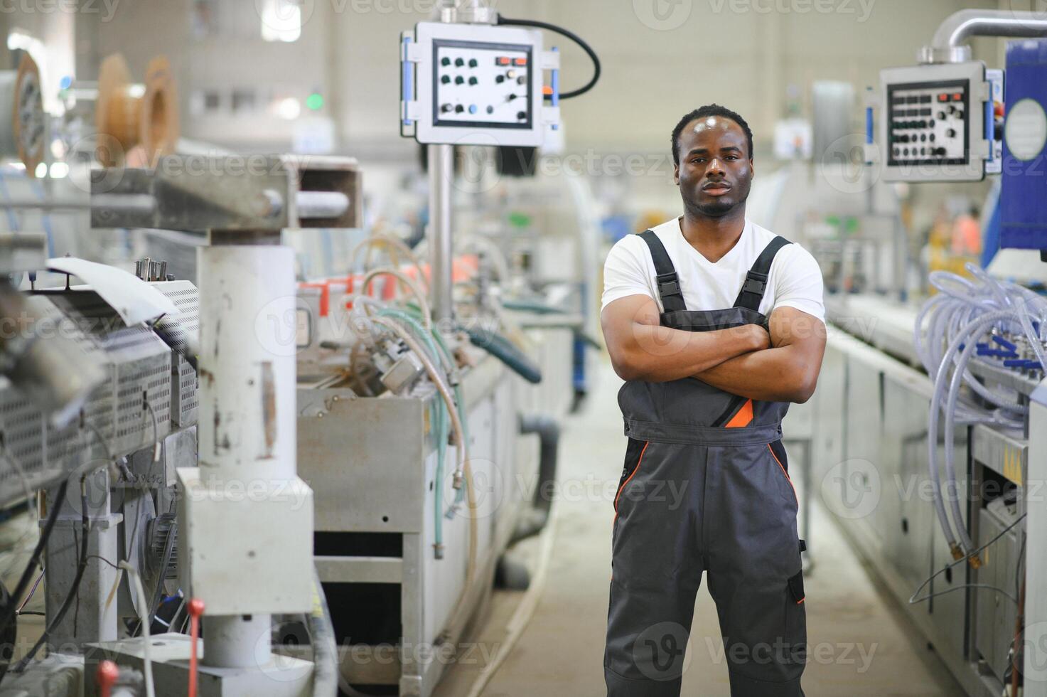 Manual worker assembling PVC doors and windows. Factory for aluminum and PVC windows and doors production photo