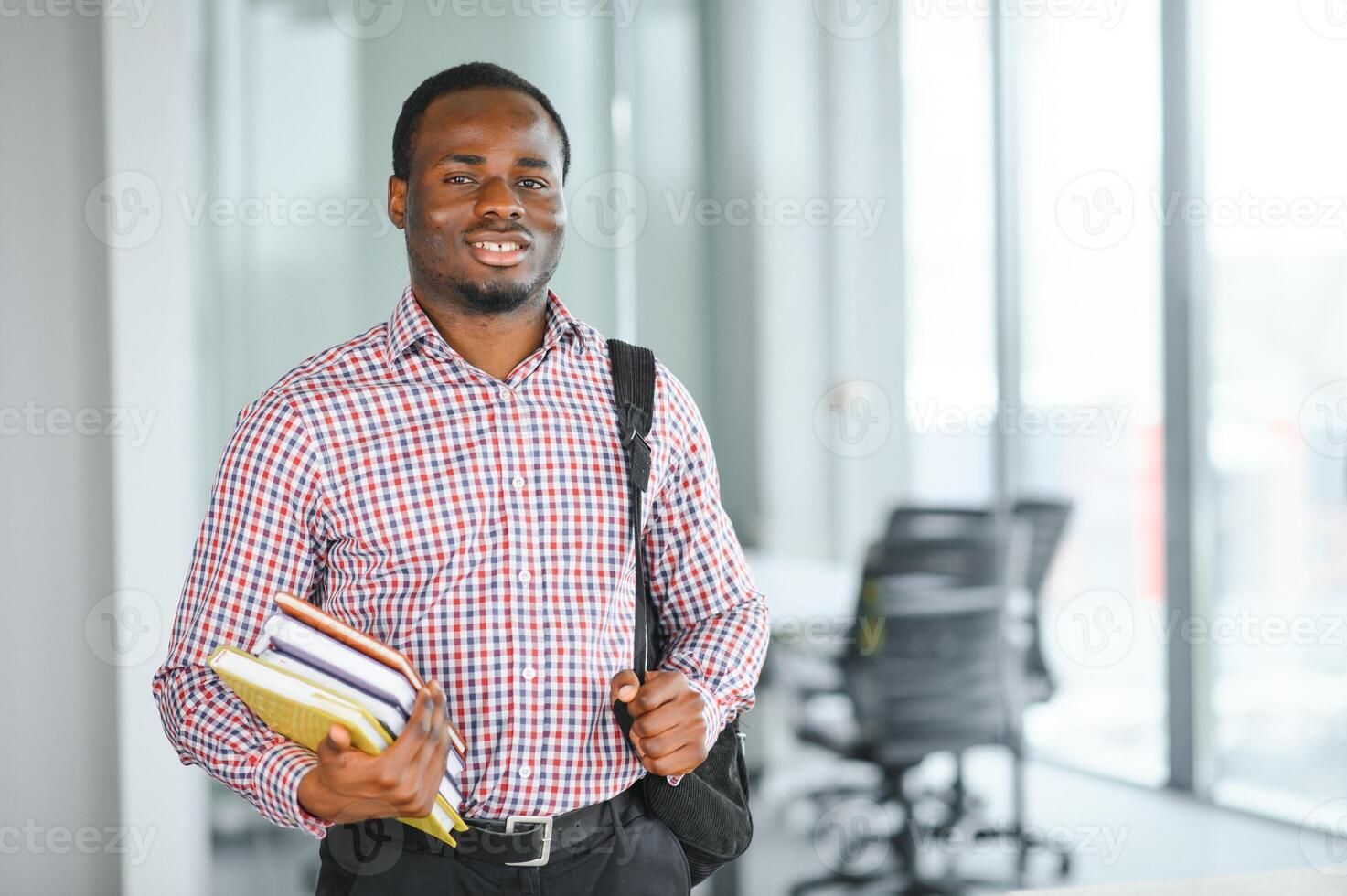 black student at university classroom and thinking of something photo