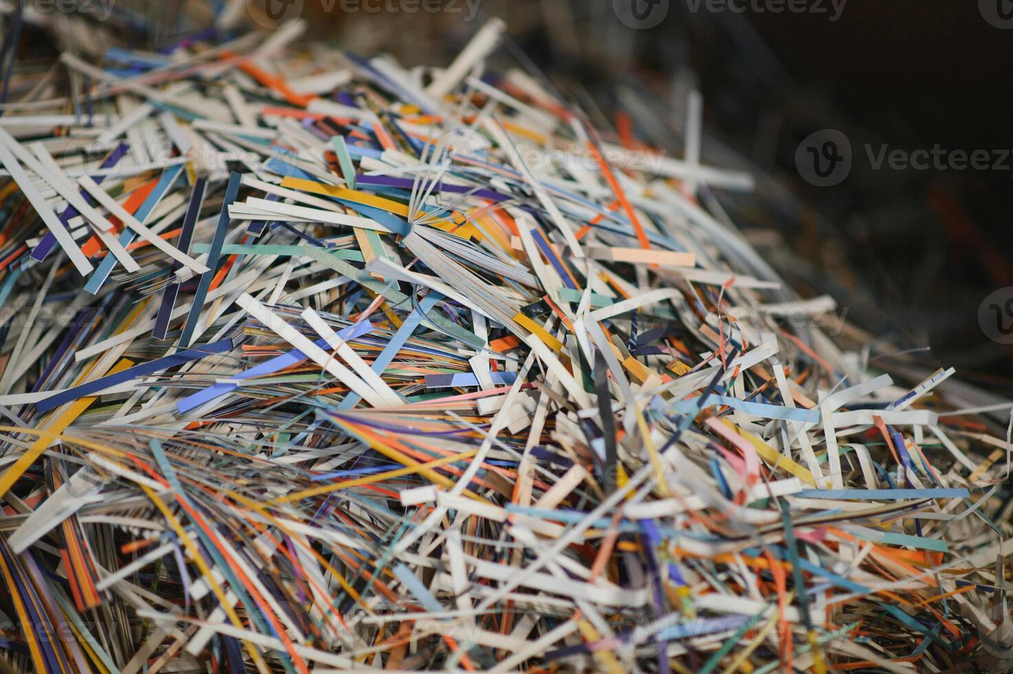 waste paper, scraps of printed materials in a modern printing house photo